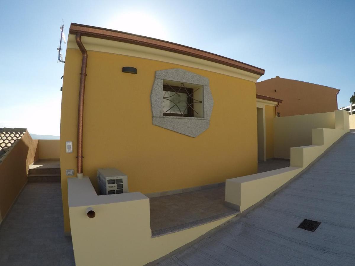 Aquilone Apartment Badesi Bagian luar foto