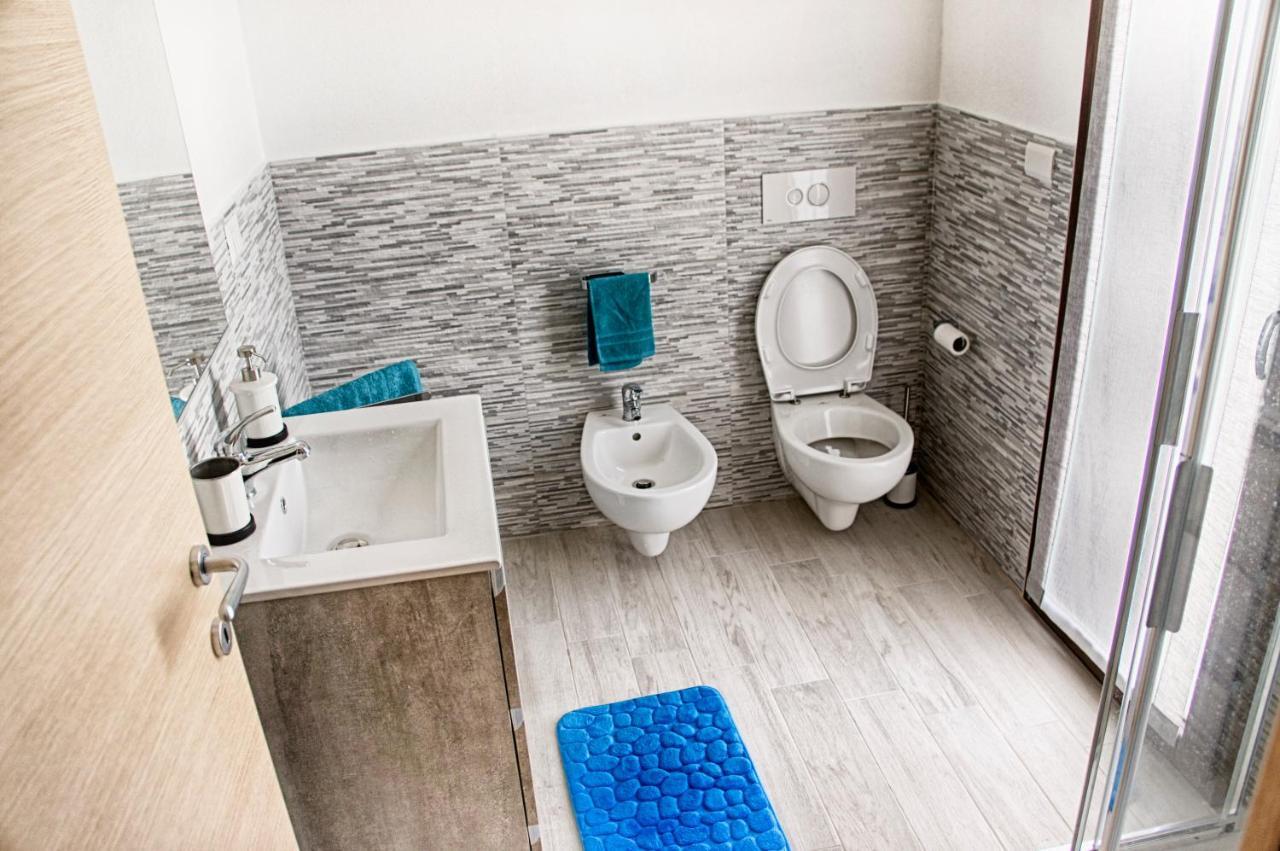 Aquilone Apartment Badesi Bagian luar foto